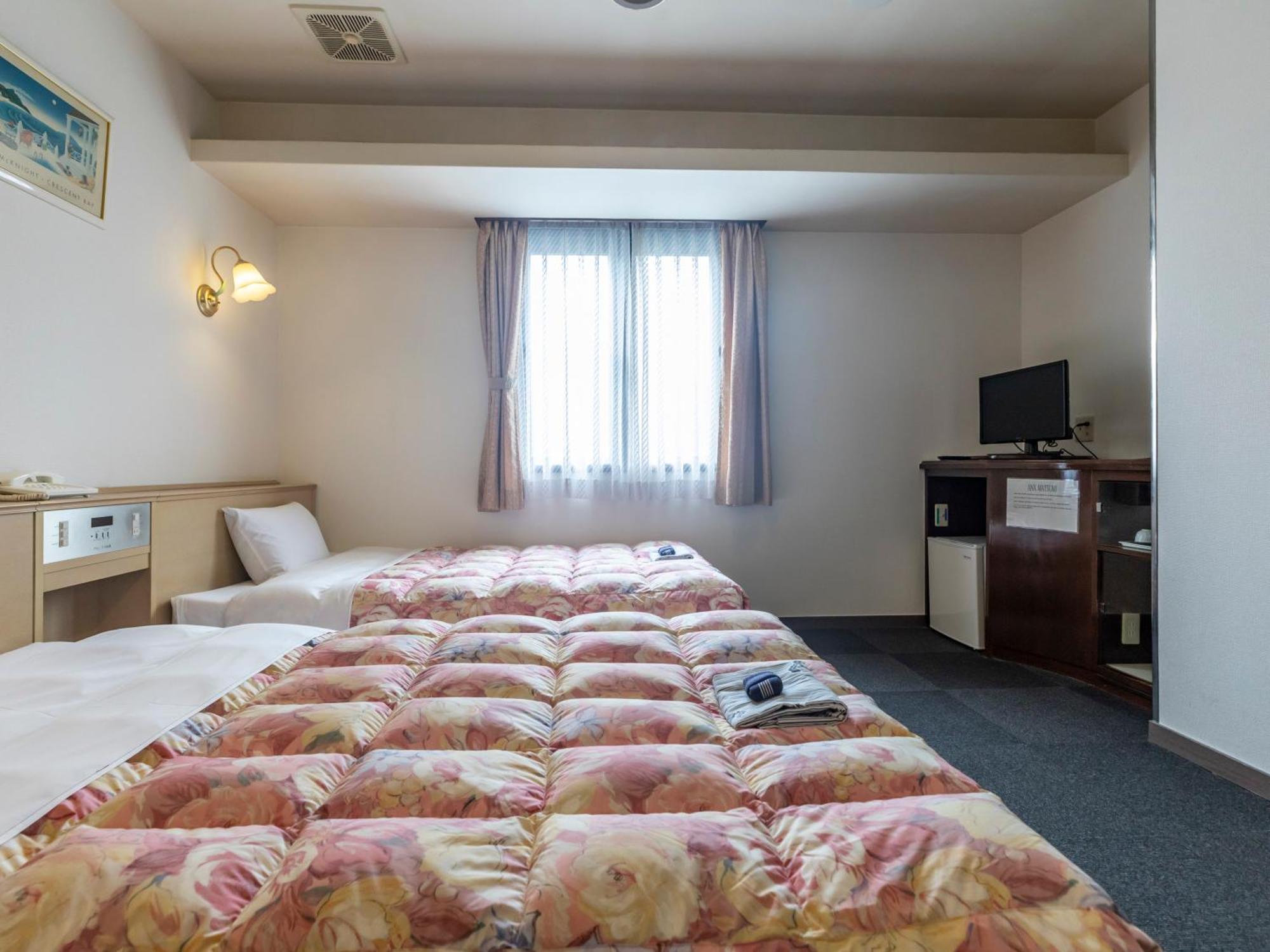 Tabist Annex Matsumi Hotel Beppu Quarto foto