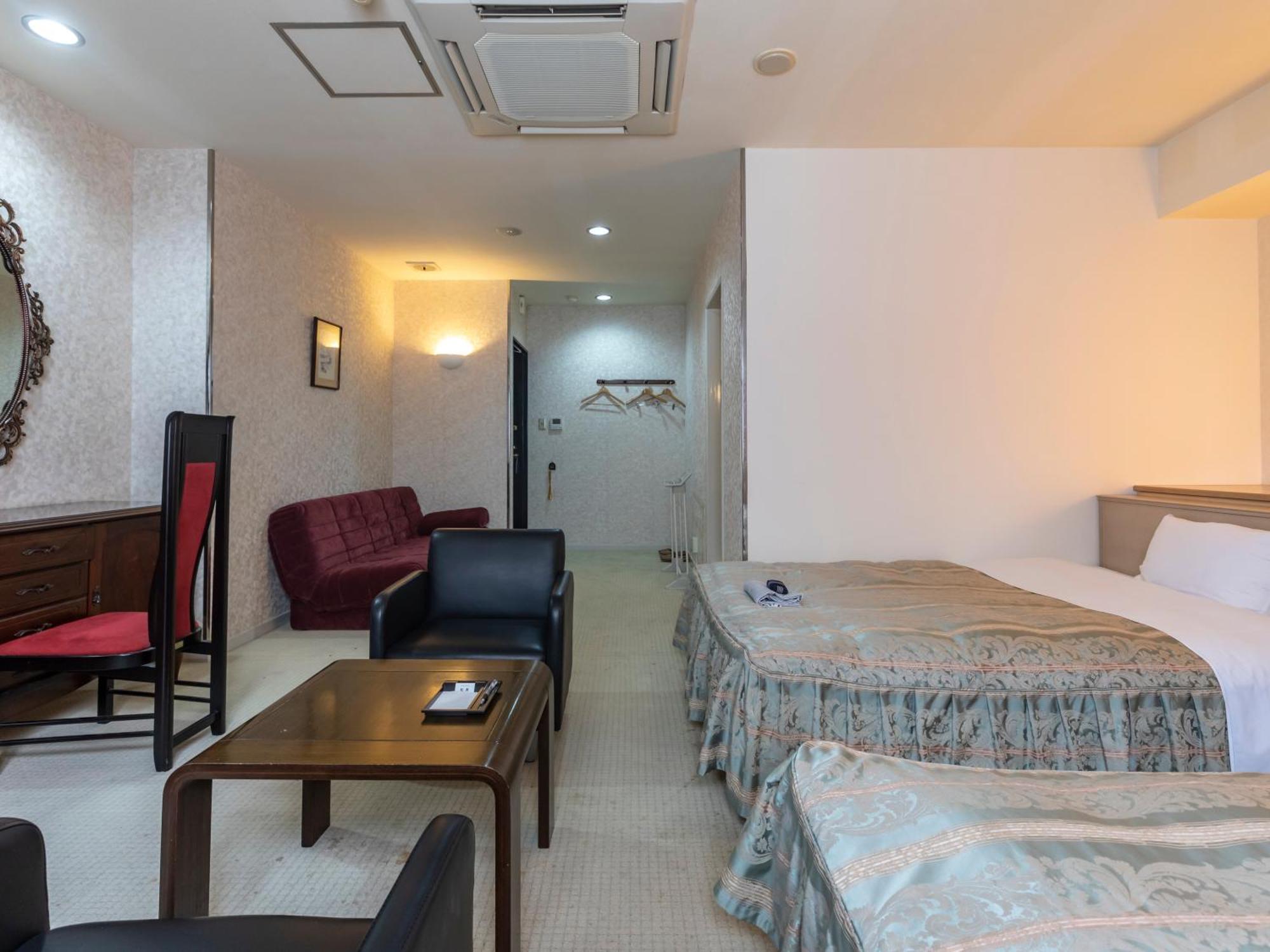 Tabist Annex Matsumi Hotel Beppu Quarto foto