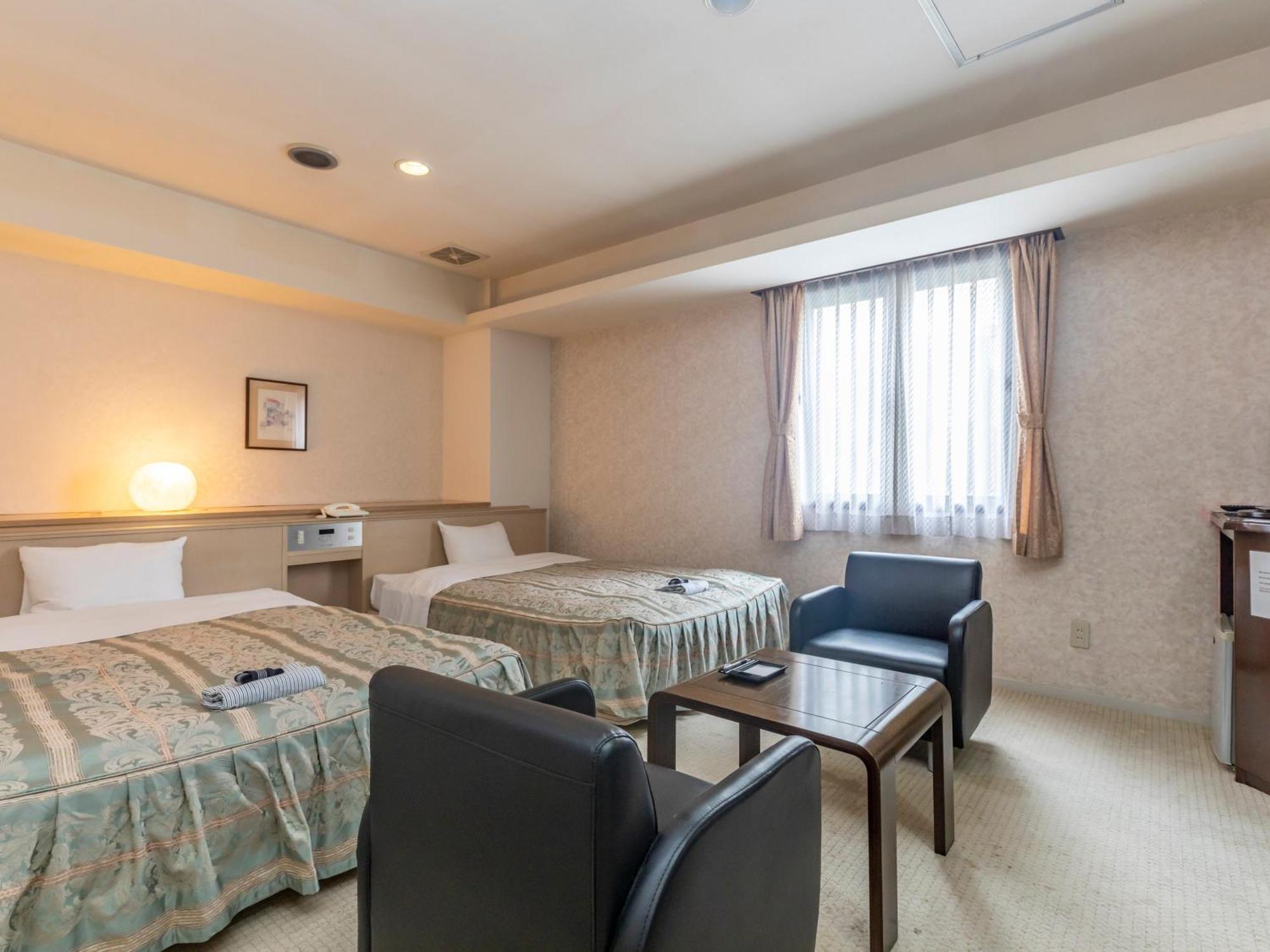 Tabist Annex Matsumi Hotel Beppu Quarto foto