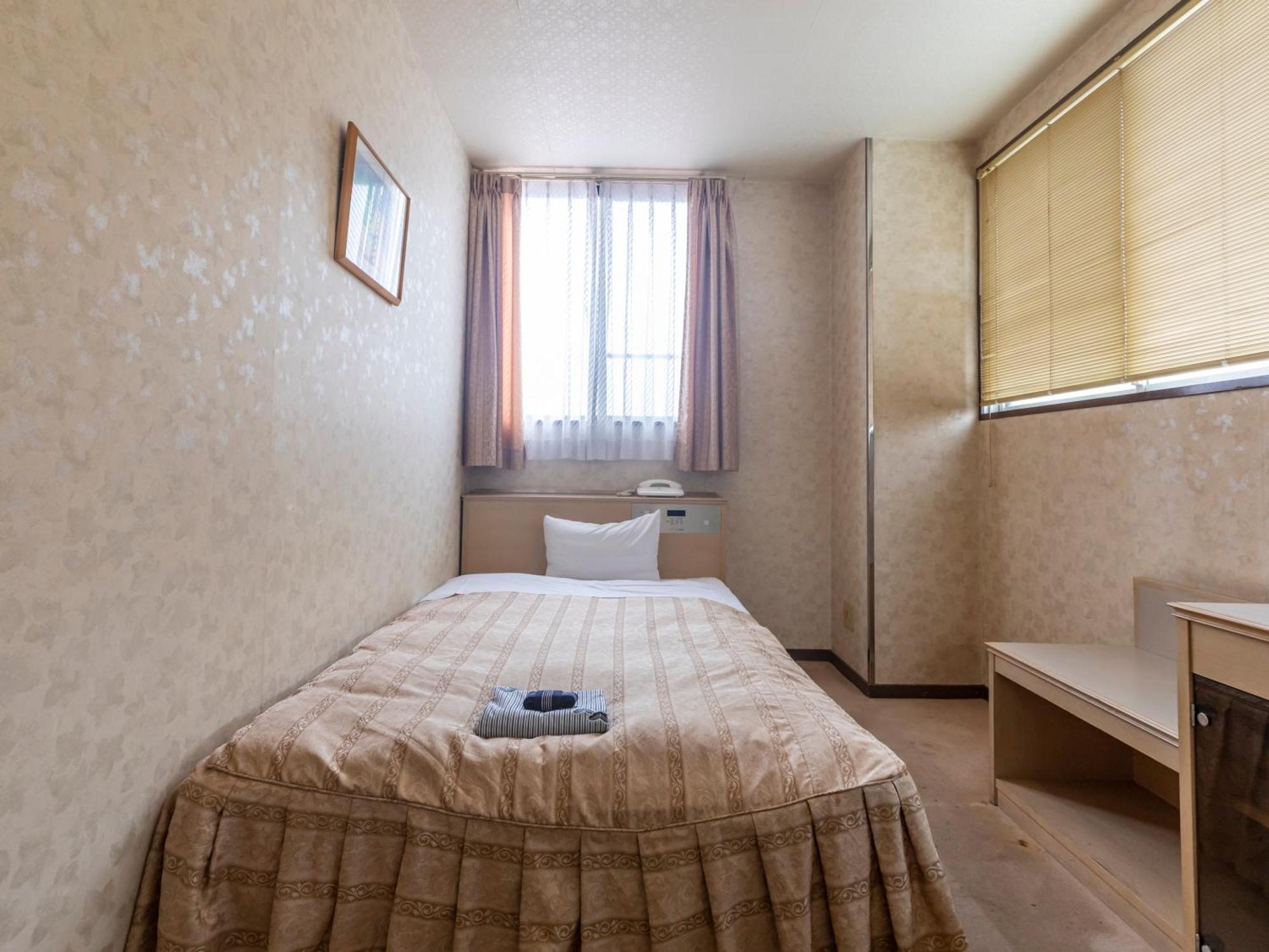 Tabist Annex Matsumi Hotel Beppu Quarto foto