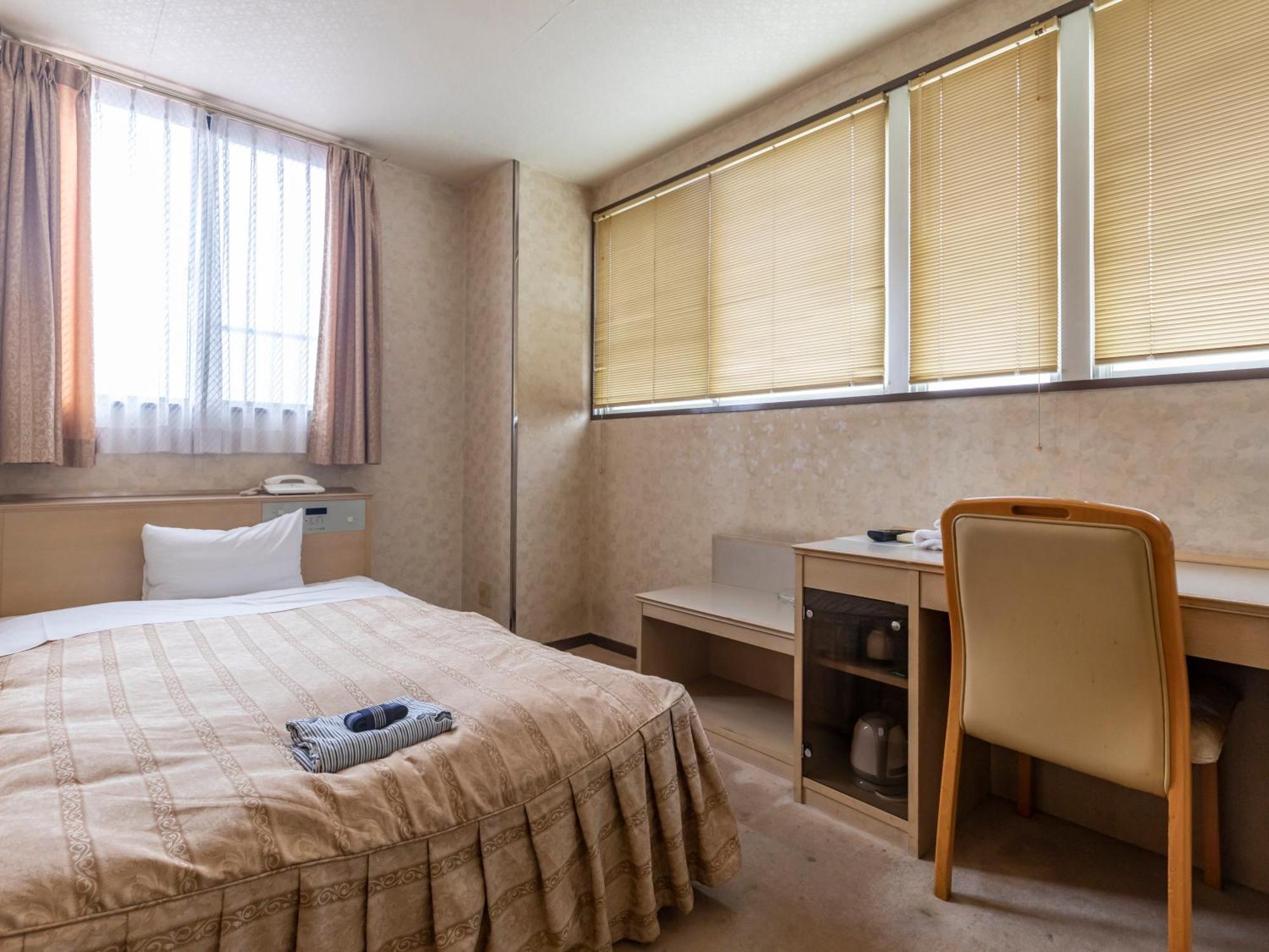 Tabist Annex Matsumi Hotel Beppu Quarto foto